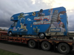 The Marrying Mum and Dad Motorhome on a Low Loader